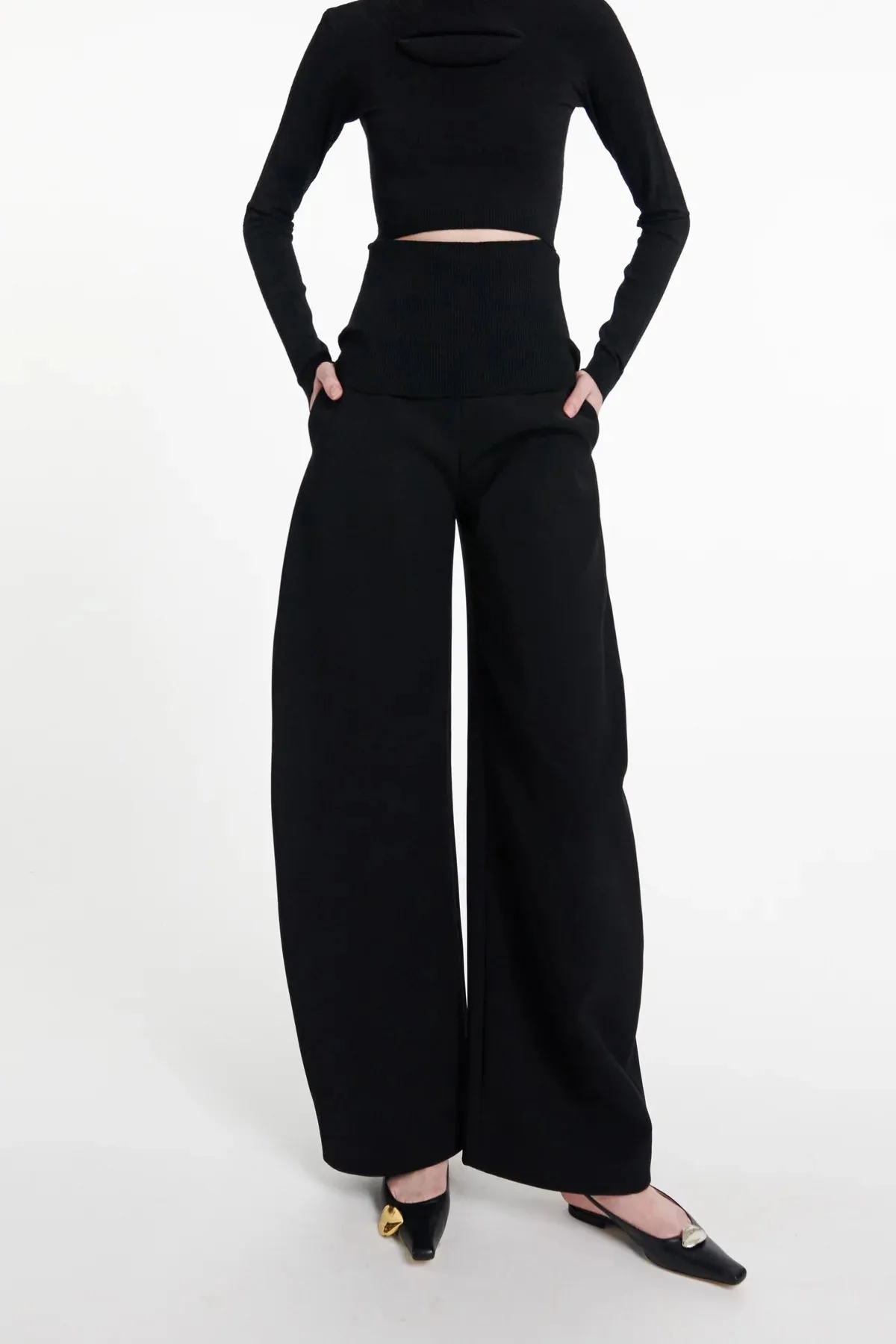 Rounded Tailored Trousers in Black by A.W.A.K.E. Mode