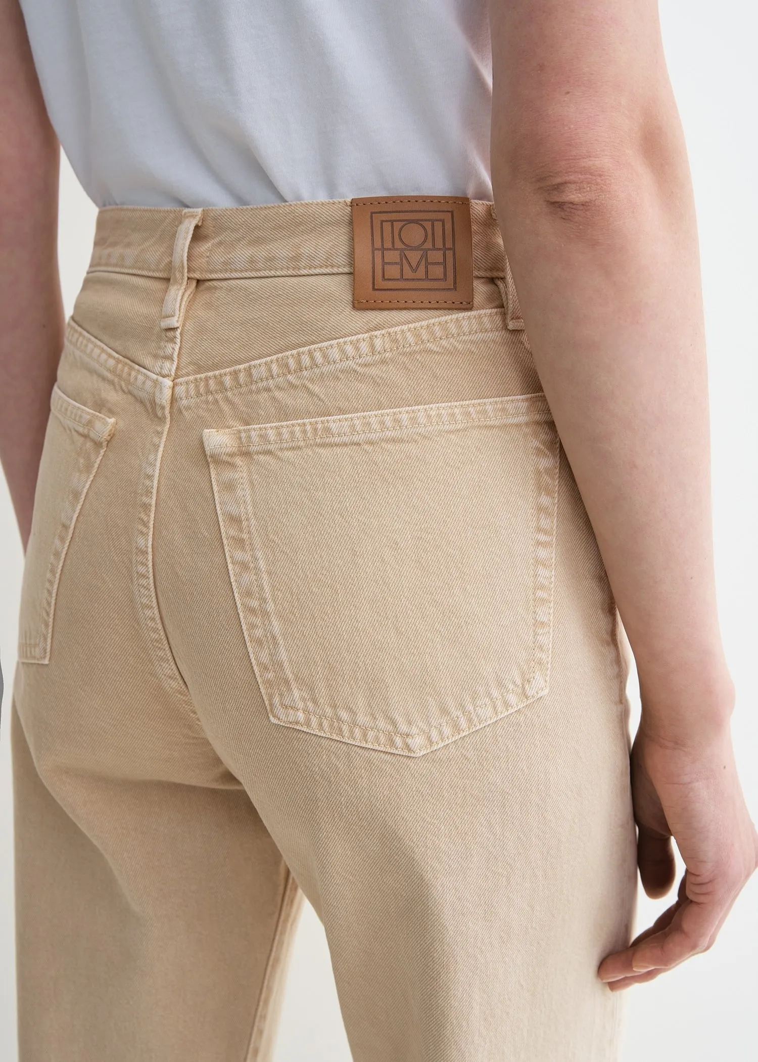 Twisted seam denim full length washed beige